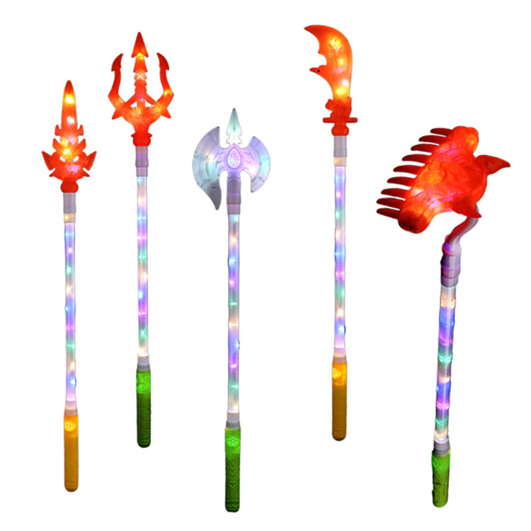 Žaislas su švytinčiu ginklu